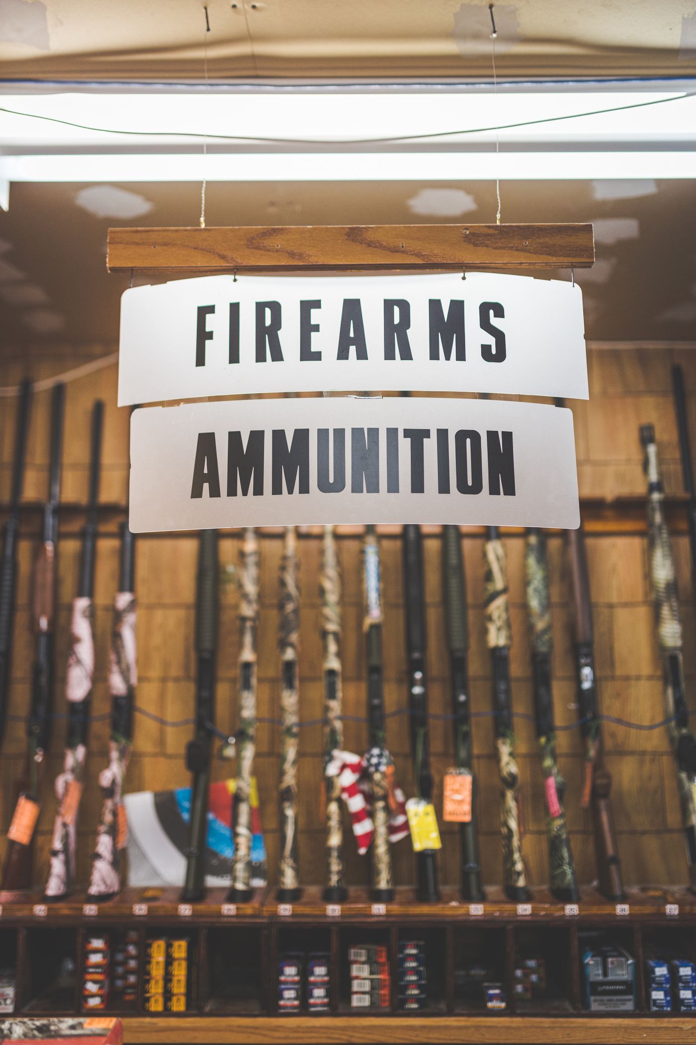Firearms and ammunition signage inside a gun shop